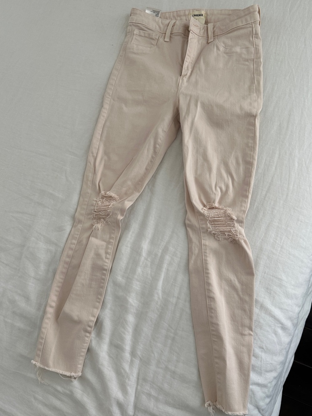 Light Pink Distressed Skinny Jeans